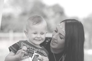 toddler and mum smiling