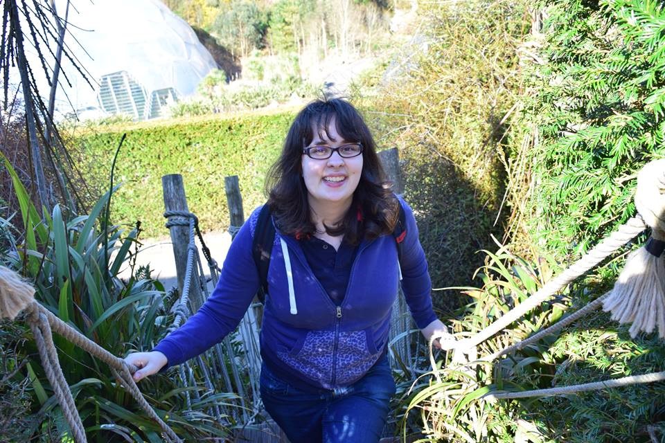 Cathryn climbing stairs smiling